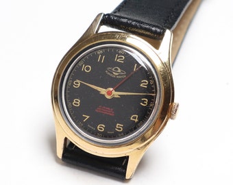 Magnifique montre-bracelet suisse Planesa vintage des années 1950, montre mécanique classique, cadeau merveilleux pour un anniversaire ou un anniversaire