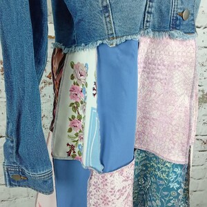 Close up of blues and pink fabric. One fabric has pink flowers
