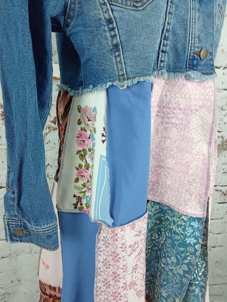Close up of blues and pink fabric. One fabric has pink flowers