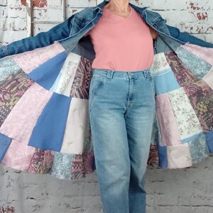 Inside shown of the long duster. Three tiers in blue and pink.