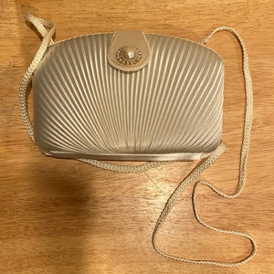 Carlo fellini purse best sale