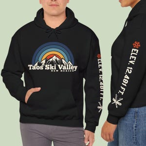 Camiseta de snowboard de Taos Ski Valley, Nuevo México, para esquiar, para amantes de la montaña en estaciones de esquí, sudadera con capucha unisex de esquí de Nuevo México