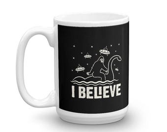 I believe Bigfoot Loch Ness Monster Yeti UFO Mug