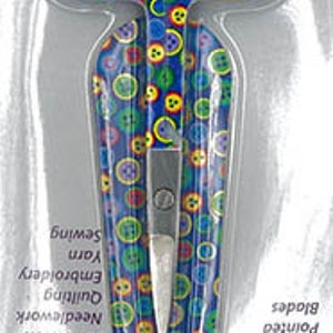 May include: Small, stainless steel scissors with pointed blades, perfect for needlework, quilting, embroidery, yarn, and sewing. The handles and sheath feature a blue background with a colorful button pattern. The scissors are 3.75 inches (9.6 cm) long.