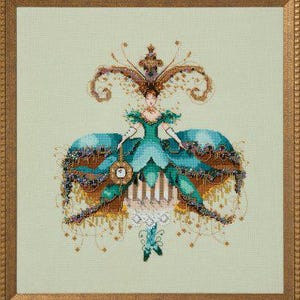 May include: A framed cross-stitch artwork featuring a woman in a teal and gold gown with elaborate embellishments. The artwork has a detailed design with a crown and a clock-like accessory. The frame is a warm gold color.