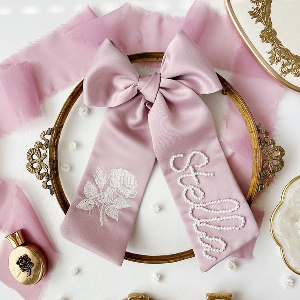 La Vie En Rose Bespoke Bow - Bespoke Mauve Rose Custom Name Beaded Bow With Pearls