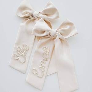 Bespoke Ivory Custom Name Beaded Bow With Pearls