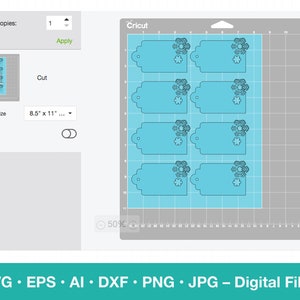 May include: A digital design for six snowflake gift tags. The tags are light blue with a snowflake design in the center. The design is shown on a digital cutting mat with a grid.