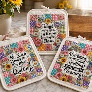 May include: Three square fabric potholders with white trim and hanging loops. Each features a colorful patchwork border of flowers and gingham patterns. The text reads: Behind Every Quilt Is A Woman Ignoring Her Chores, No Such Thing As Too Much Quilting, and Weekend Forecast Quilting With No Chance Of Cleaning.