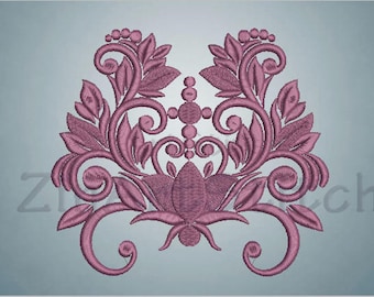 May include: A detailed embroidery design in a mauve color, featuring symmetrical floral and leaf patterns. The design includes swirling vines, stylized leaves, and a central floral element, creating a decorative and ornate appearance. The design is suitable for fabric embellishment.