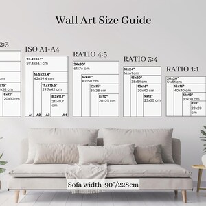May include: Wall art size guide showing dimensions in inches and centimetres. Includes ratios 2:3, 4:5, 3:4, 1:1, 5:7, and 11:14, plus ISO A1-A4 sizes. A beige sofa with a 228cm width is in the foreground.