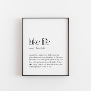 May include: Black and white typography print with the definition of "lake life" as a peaceful escape from daily routines where laughter is as abundant as the water. It's where the spirit syncs with nature, and time follows the sun's gentle path. At the lake, every moment is a serene adventure, and simple joys come to life.