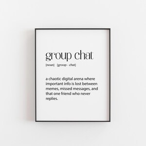 May include: A framed print with the words "group chat" in a black font. The definition below describes a chaotic digital space where important information is lost. The print is in a black frame.