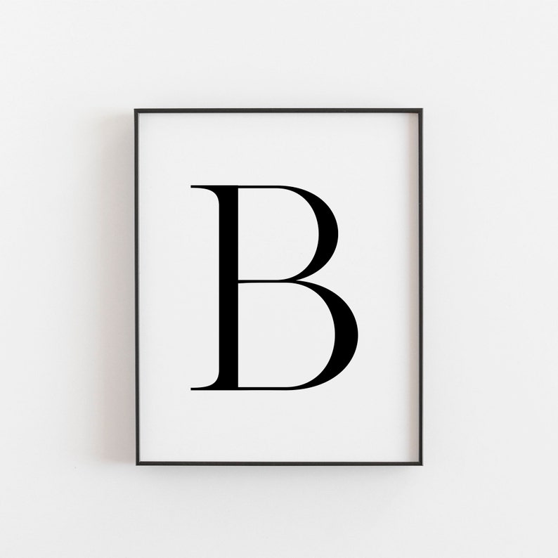 Minimalist black and white Capital B Print with bold contrast and clean lines, available in multiple sizes and gold foil options. Handmade on premium quality paper, perfect for modern wall decor and as an educational tool.