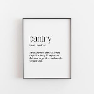 May include: A framed print with the word "pantry" in a stylish font. The definition below describes a pantry as a treasure trove of snacks, with chips, expiration dates, and crumbs. The frame is black.