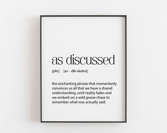 May include: Black and white printable wall art with the definition of the phrase "as discussed". The definition reads: "the enchanting phrase that momentarily convinces us all that we have a shared understanding, until reality fades and we embark on a wild goose chase to remember what was actually said."