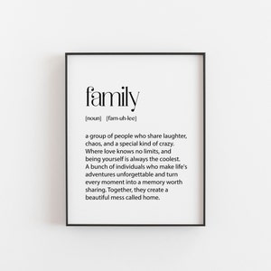 May include: Black and white printable wall art with a definition of the word "family". The definition reads: "a group of people who share laughter, chaos, and a special kind of crazy. Where love knows no limits, and being yourself is always the coolest. A bunch of individuals who make life's adventures unforgettable and turn every moment into a memory worth sharing. Together, they create a beautiful mess called home."