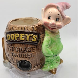 Vintage Disney Pencil Sharpener and Pencil and Pen Holder.