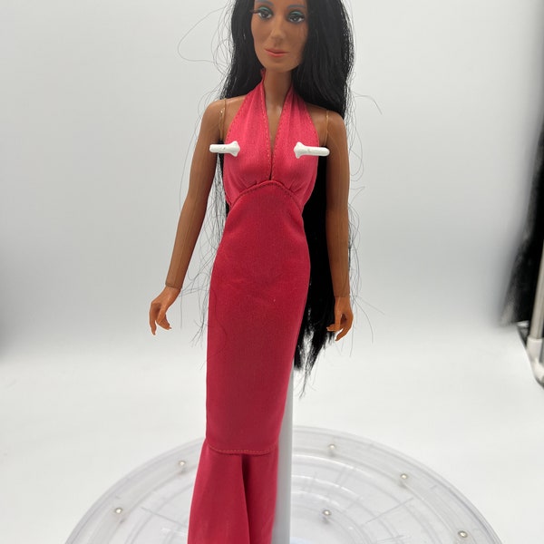 1976 Cher Doll by Mego Corp. Doll is in excellent condition. Complete outfit with shoes!!