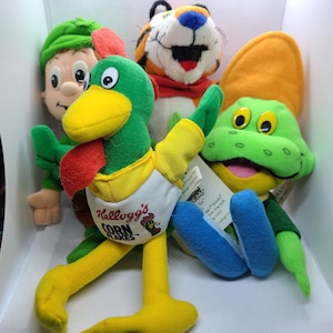 Vintage 1997 Kellogg's Cereal Character Plush. Lucky Charms, Corn Flakes. Sugar Smacks, Frosted Flakes and Fruit Loops.
