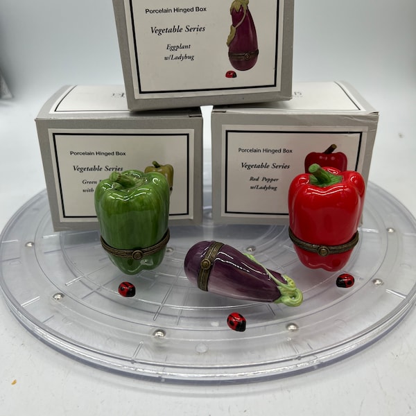 Red Bell Pepper, Green Bell Pepper and Eggplant Porcelain Hinged Box each has a Ladybug Trinket. Sold Separately!