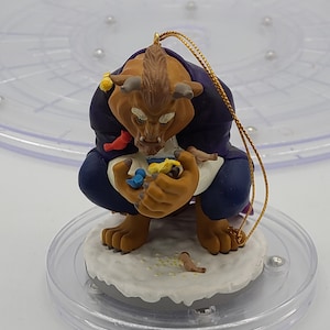 1990’s Enesco Disney&#39;s Beauty Christmas Ornament Beast Feeding Birds.