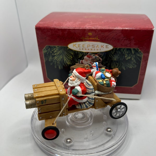 1997 Hallmark Keepsake The Claus-Mobile Here Comes Santa Christmas Ornament.