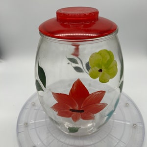 Vintage 1950s Barlett Collins clear glass cookie  jar with red lid.