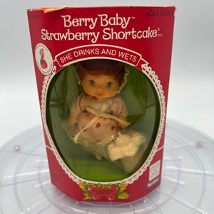 Rare 1984 Berry Baby Strawberry Shortcake Doll New in Box! She drinks and wets. Strawberry scented. Doll and bottle included.