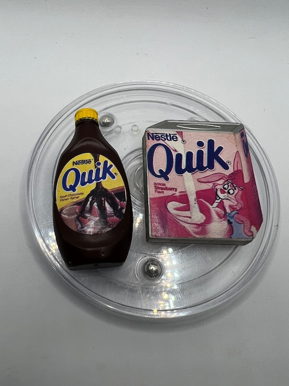 Magnete da frigorifero Nestlé Quik Nesquik del 1987, cioccolato e fragola.  Venduto separatamente -  Italia