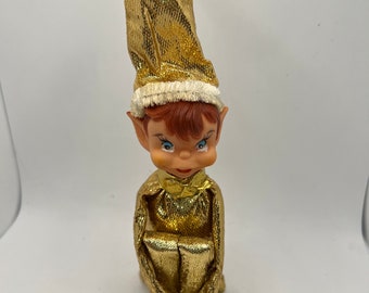 Vintage Knee Hugger Elf in Gold Metallic Jumpsuit with Chenille Trim.