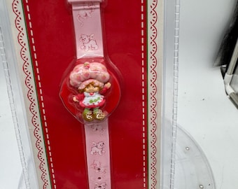 Strawberry Shortcake 3D Wrist Watch with Custard on the band in original pack.