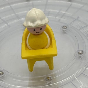Vintage Fisher-Price Little People Baby with Bonnet in High Chair.