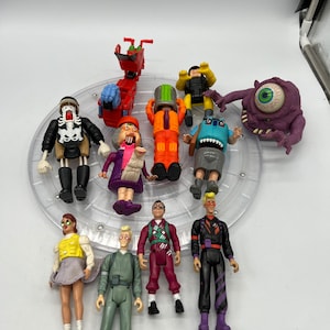 1980’s Ghosterbusters Action Figures and Haunted Humans and Haunted Vehicles. Sold Separately!