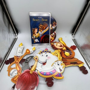 Espositore per videonoleggio Disney con personaggi del film o del videogioco La Bella e la Bestia. Venduto separatamente!