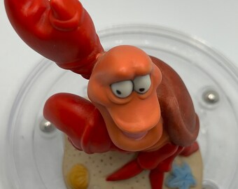 ヴィンテージのディズニーの「リトル・マーメイド」セバスチャンの磁器