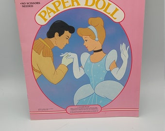 Livro vintage, novo, de estoque antigo, de 1989, da Golden Book, com bonecas de papel da Cinderela da Disney.