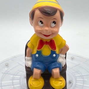 Vintage Walt Disney’s Pinocchio Piggy Bank.