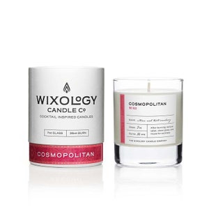 May include: A white candle jar with a black label that reads "Wixology Candle Co. Cocktail Inspired Candles" and "Cosmopolitan" with a pink accent. The candle is 7 ounces and has a 36-hour burn time.