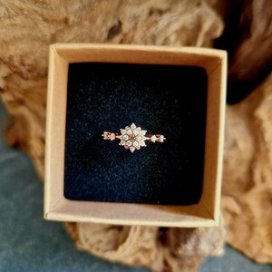 Rose gold snowflake ring image 3
