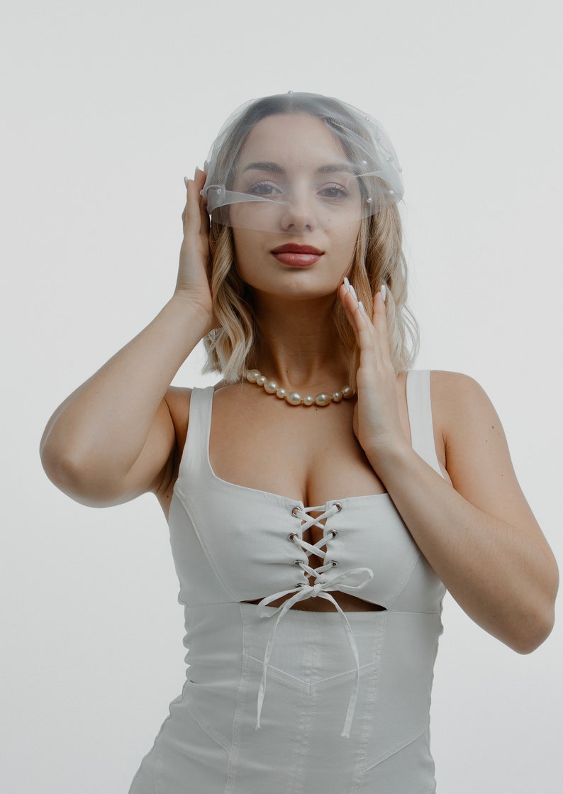 Handmade Birdcage Veil with Pearls Elevate your allure with this exquisite accessory. image 5