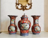 Petrus Regout Maastricht large antique handpainted three-piece Chinese imari style garniture cabinet vases set