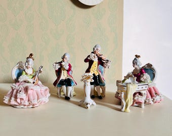 Figuras de porcelana de Dresde: par coleccionable con ribete de encaje, fabricadas en Alemania