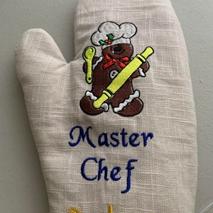 Oven mitt.Both side high heat protection.Cute embroidery design.Be a Master Chef at your kitchen.14 in length good protection for your hand.