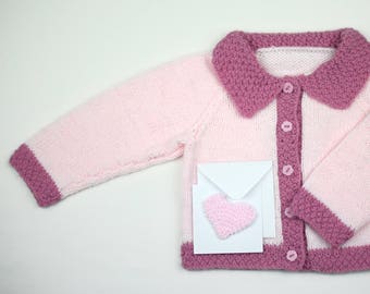 Hand knitted baby girl cardigan.Pale pink with contrast edging.Matching gift card.