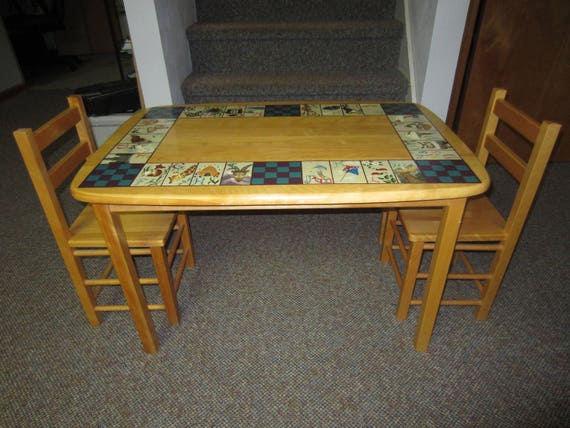 children's table with 2 chairs