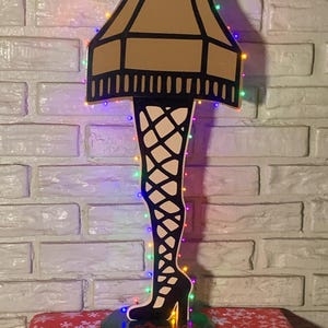 A Christmas Story Leg Lamp Replica with lights