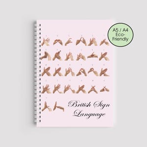 May include: A set of three ceramic mugs with a speckled, matte finish. The mugs are in shades of cream, light gray, and dark gray. Each mug has a simple, minimalist design, perfect for coffee or tea.