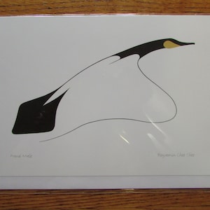 May include: A black and white stylized illustration of a bird in flight. The bird has a yellow beak and a white body with black wings. The text "Proud Male" and "Benjamin Chee Chee" are printed below the image.