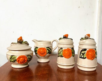 Vintage Made In Japan Porcelain Sugar, Creamer, Salt and Pepper Set Tan with Orange Embossed Flower